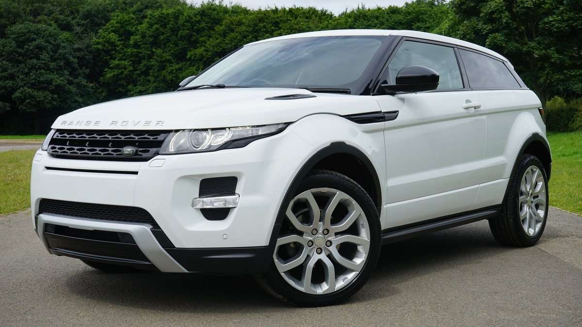 pexels-photo-116675 white land rover range rover suv on road