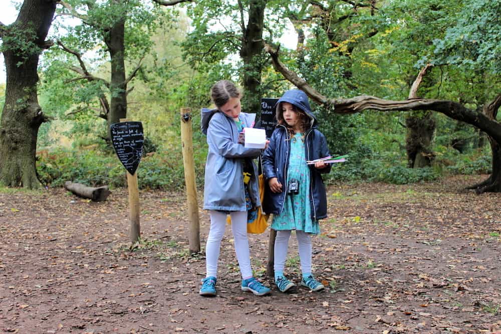 kids with clipboards in sherwood forest