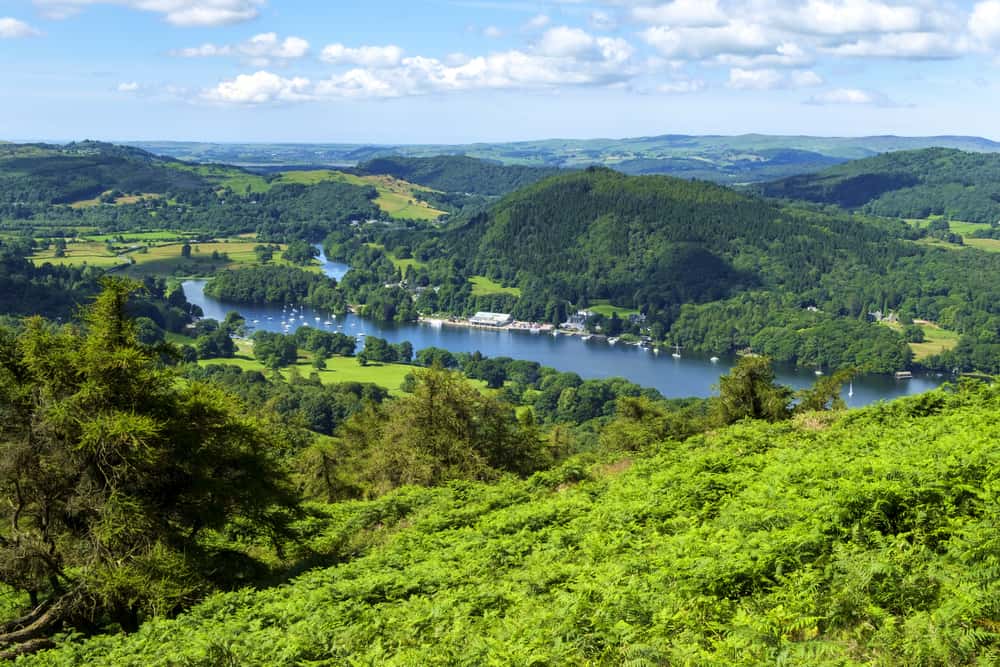 The view over south end of Lake Windermere from the path to Gummers How on a beautiful summer morning. Gummers How is a well known viewpoint in The Lake District, Cumbria, UK.