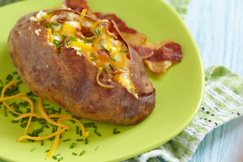 Baked Potato with bacon, cheese, chives and sour cream