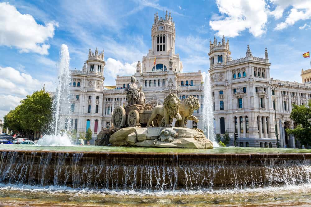 Cibeles fountain at Plaza de Cibeles in Madrid in a beautiful summer day, Spain