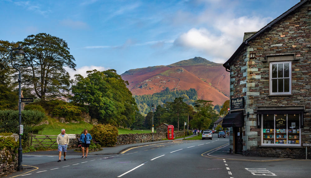 View of shops in Grasmere with Hellvellyn mountain range