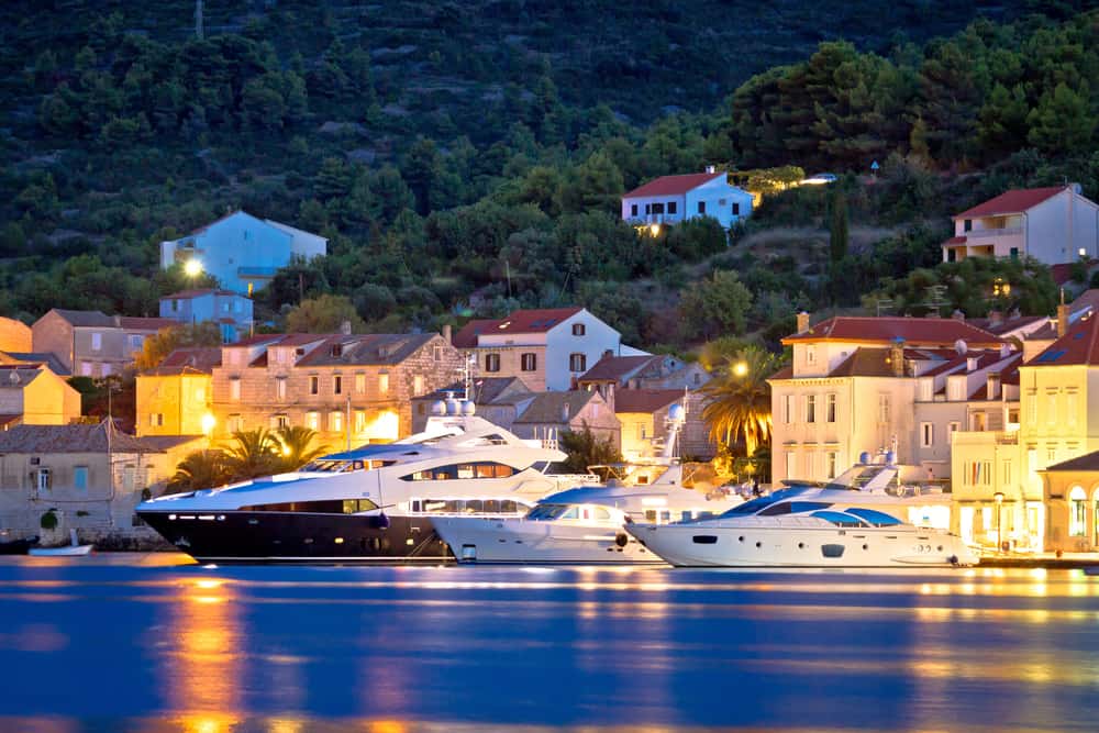 Luxury yachts in Town of Vis waterfront evening view, Dalmatia, Croatia