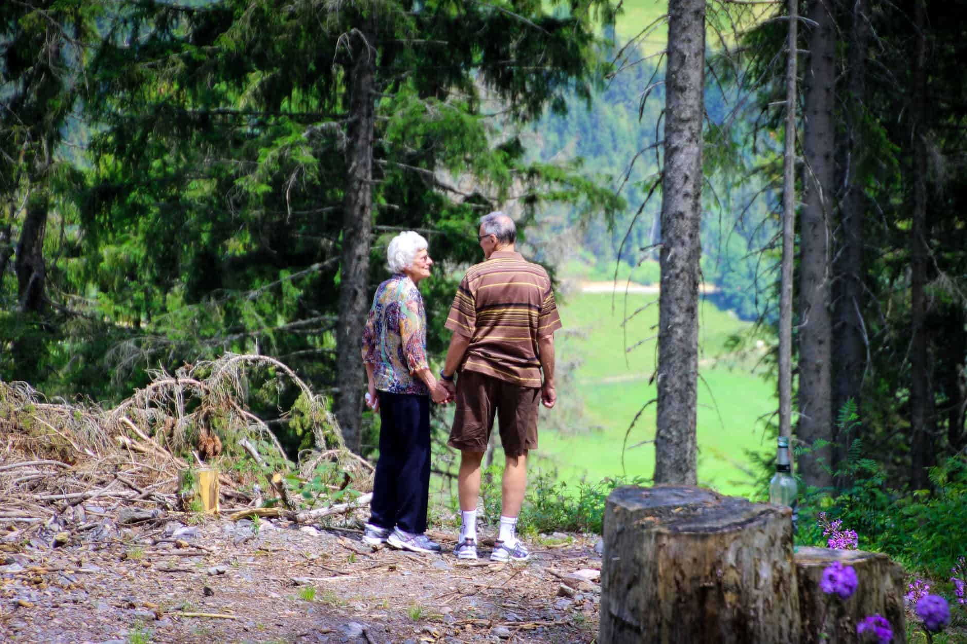 pexels-photo-1307391 two people standing in forest