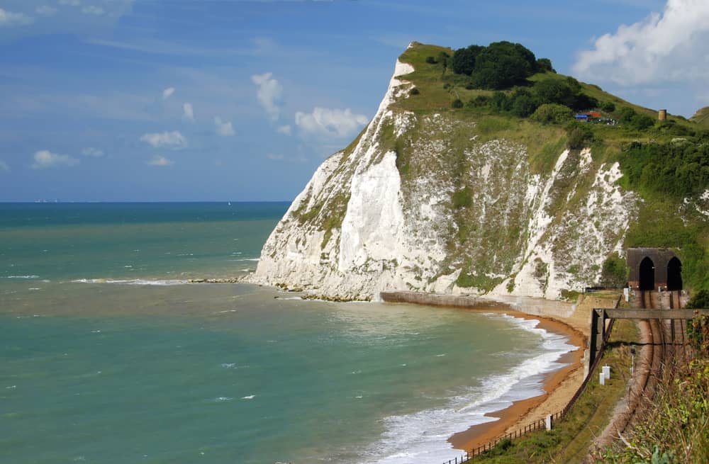Beautiful white cliffs near Dover, UK and railway