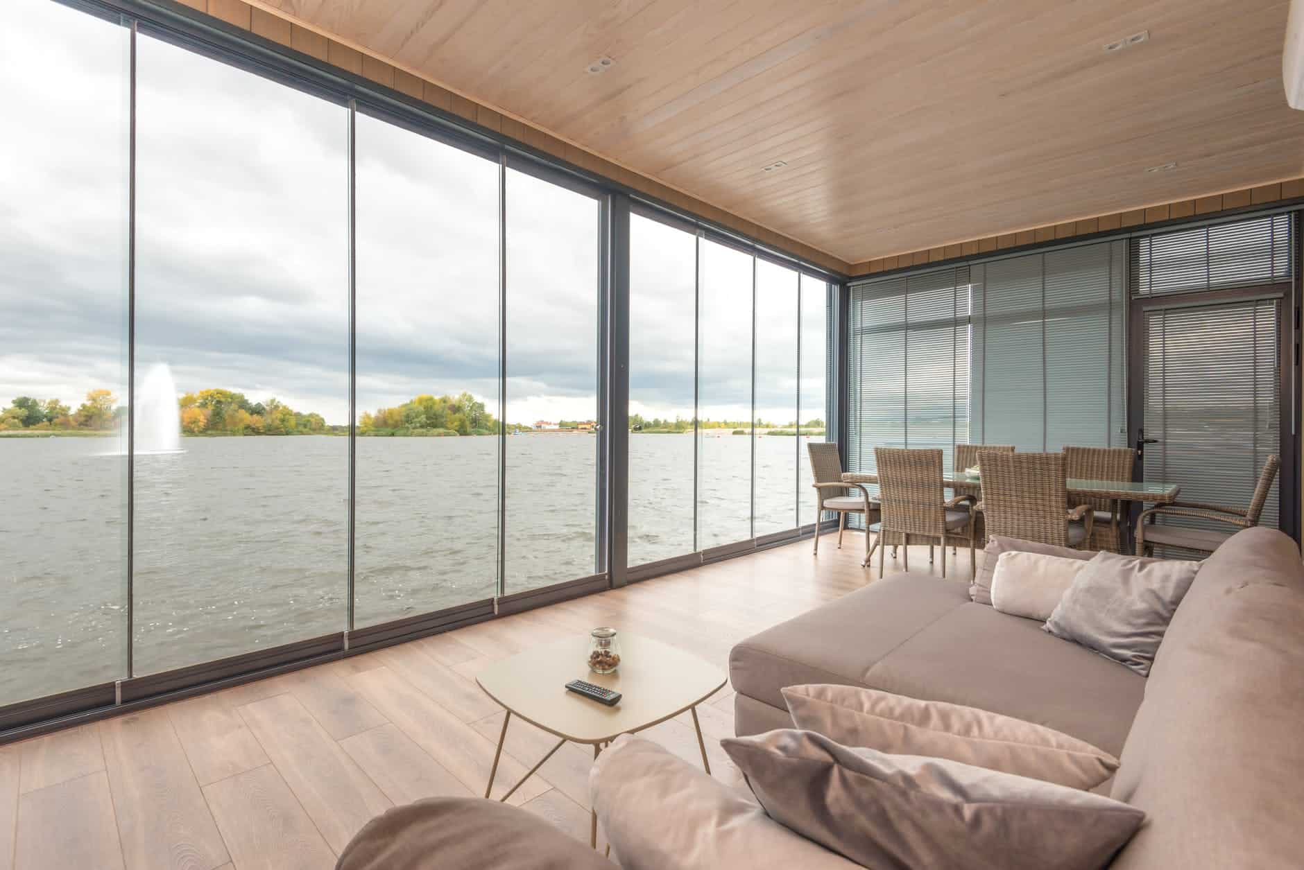 interior of contemporary house on lake on cloudy day