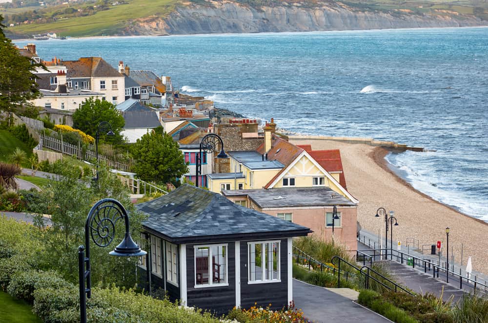 The beautiful view from the Seafront gardens to the Jurassic Coast of Lyme Regis and Lyme Bay. West Dorset. England