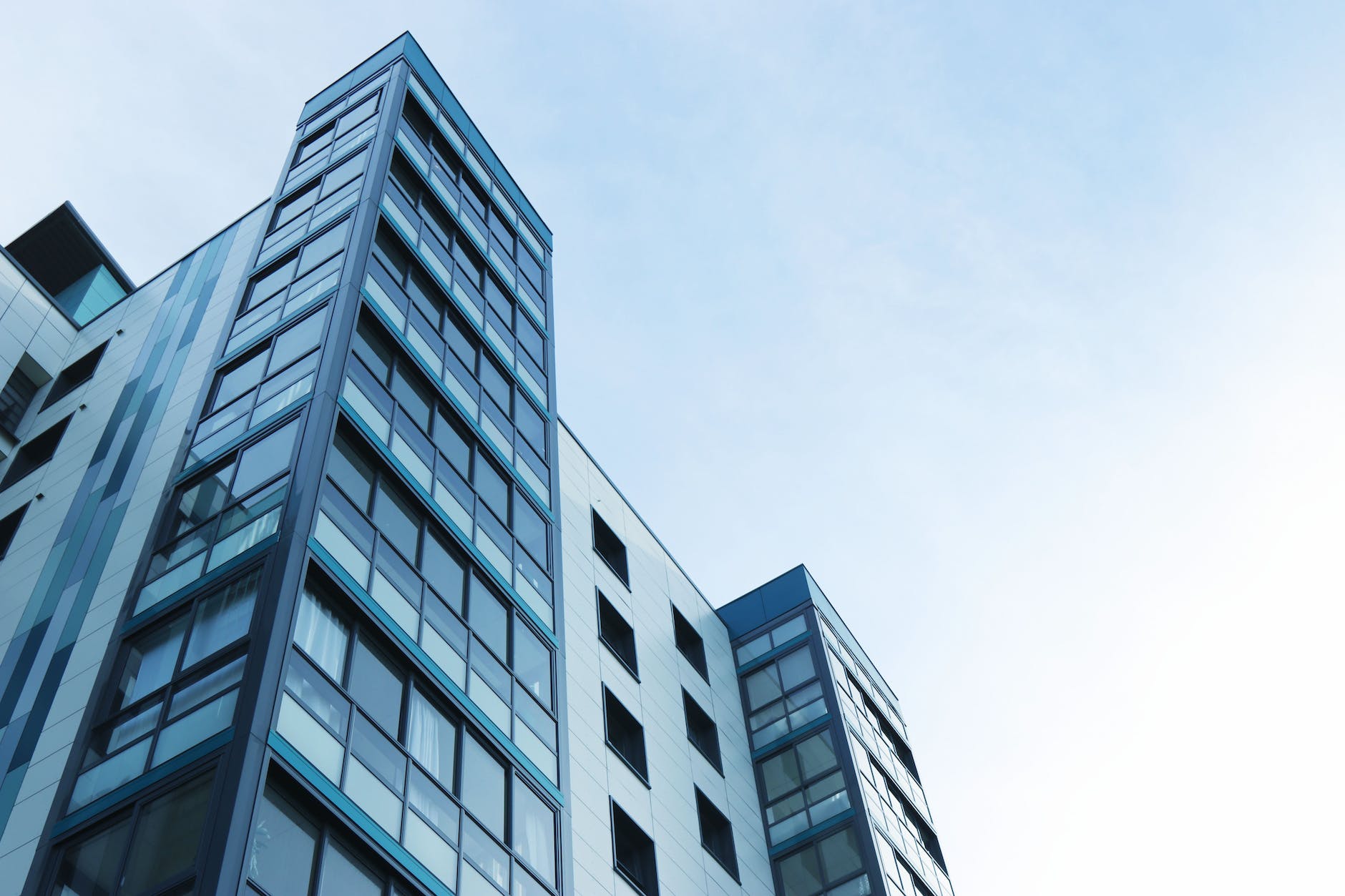 pexels-photo-323705 low angle view of office building against sky