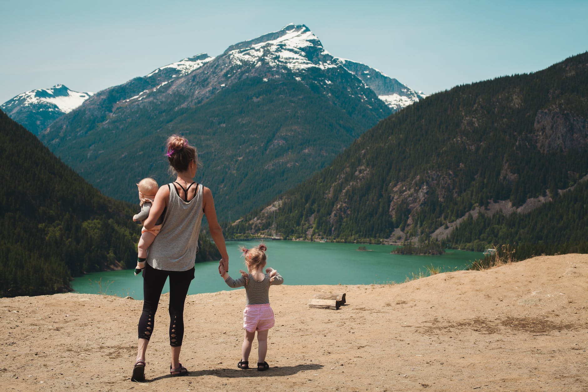 pexels-photo-1157399 mother and children walks near body of water
