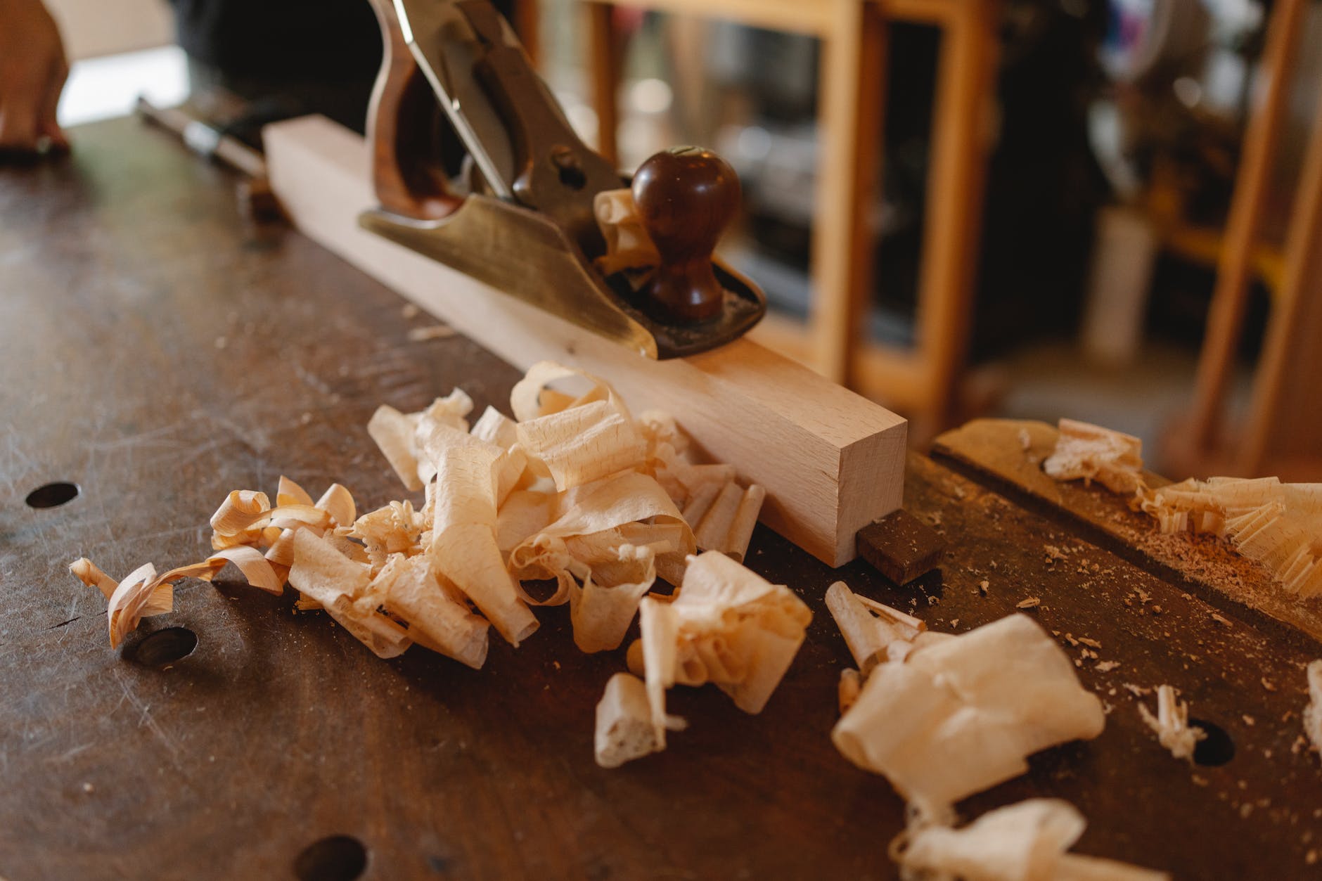 jack plane and wooden plank on table