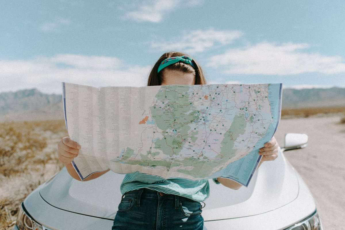 pexels-photo-3935702 woman looking at the map