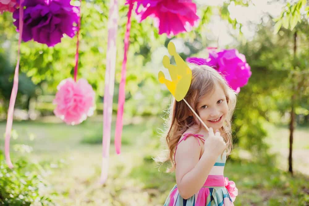 little girl with a toy crown