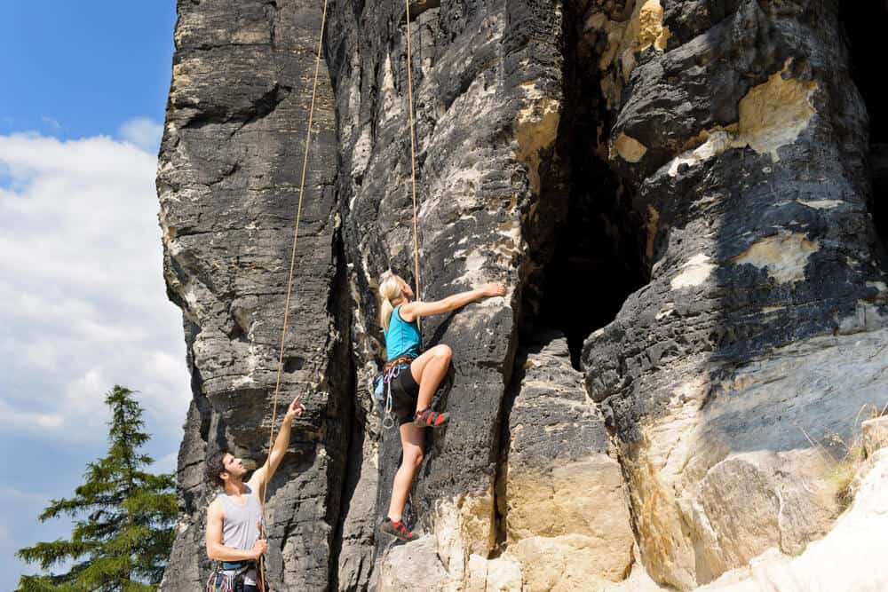 couple on rock climbing holiday