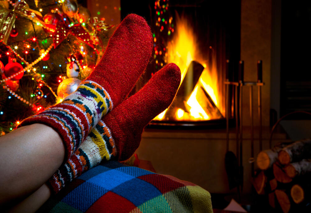 putting feet up by fire