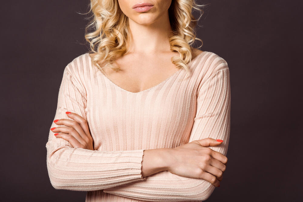 woman front view arms folded in front of chest
